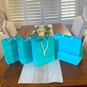 Four Tiffany & Co gift bags